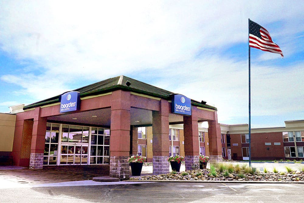 exterior of a boarders inn and suites