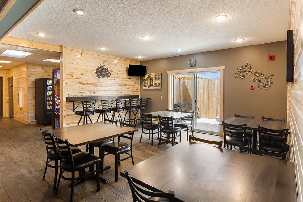 dining area seating at a boarders inn and suites